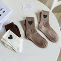Lot de trois chaussettes pour femmes.